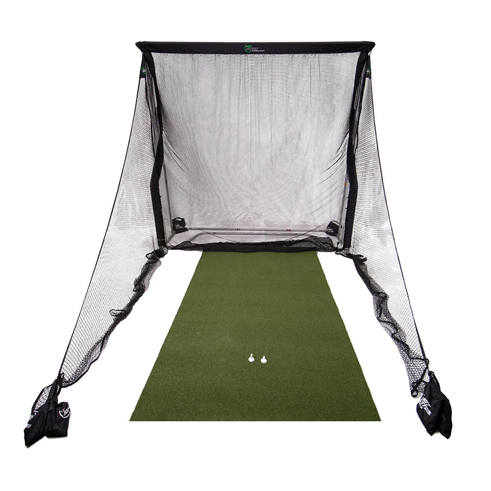 Golf practice net with green mat and golf balls on a white background