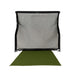Golf practice net with green mat on a white background